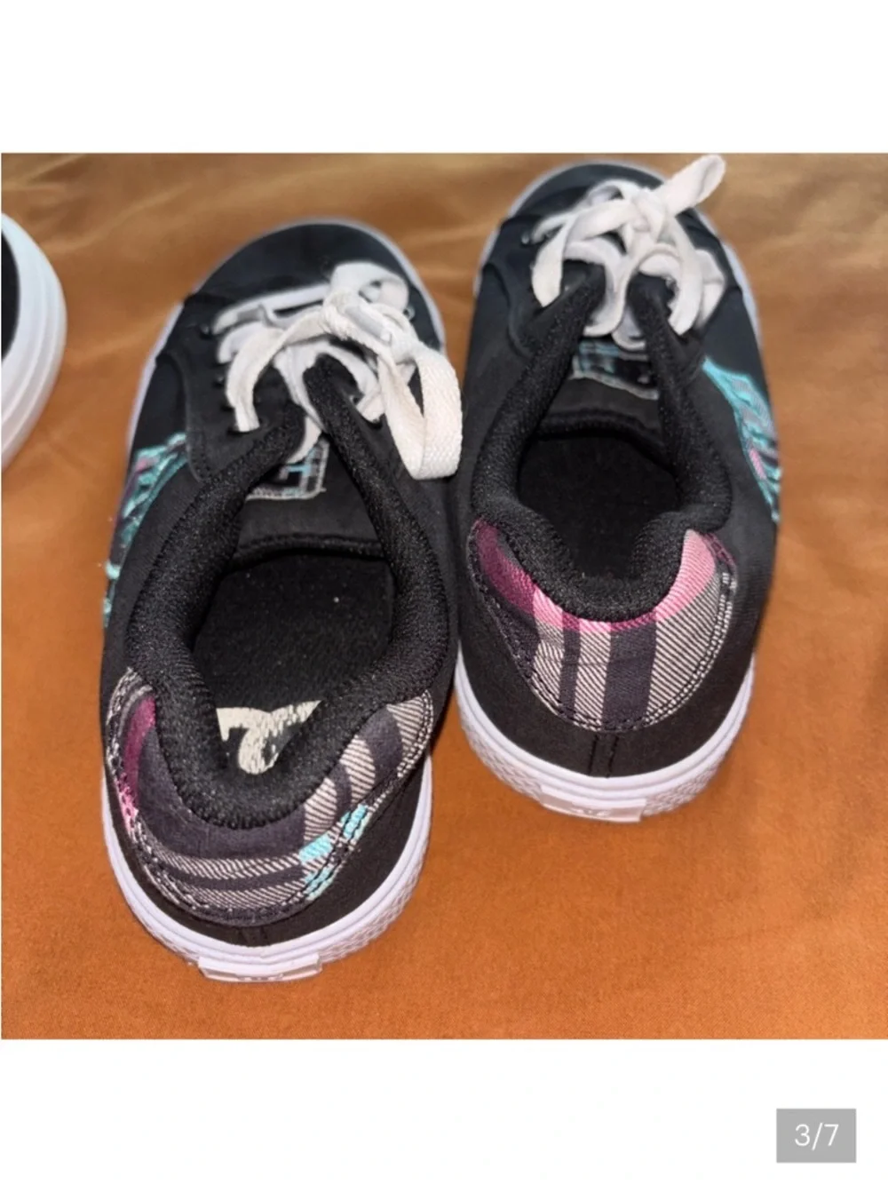 Woman’s size 6 DC Black Canvas Sneakers with White Soles and Teal Logo - Picture 3 of 5